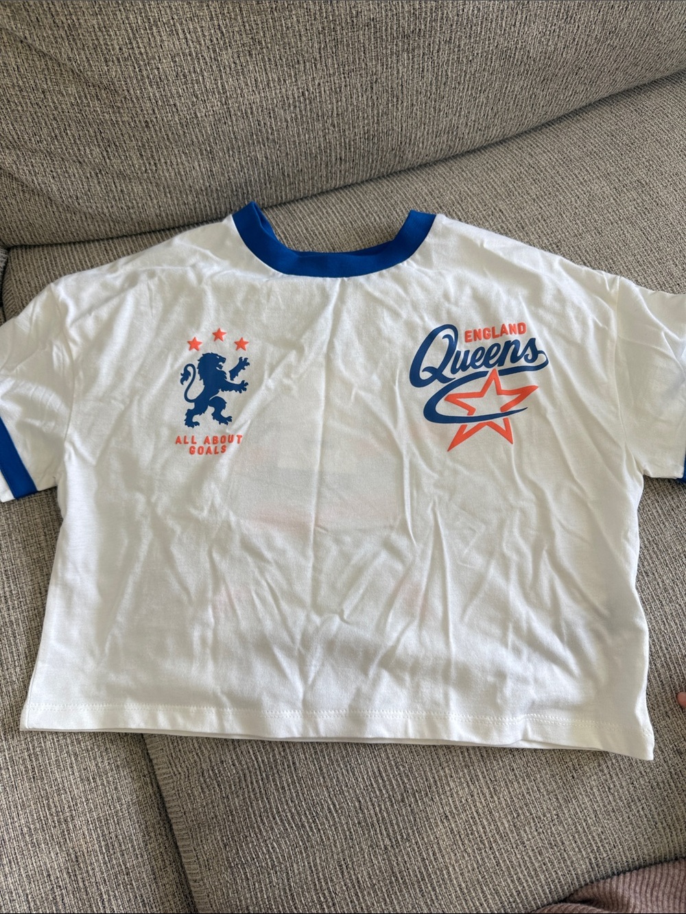 Mango White Tee with Blue Collar and Orange Graphic